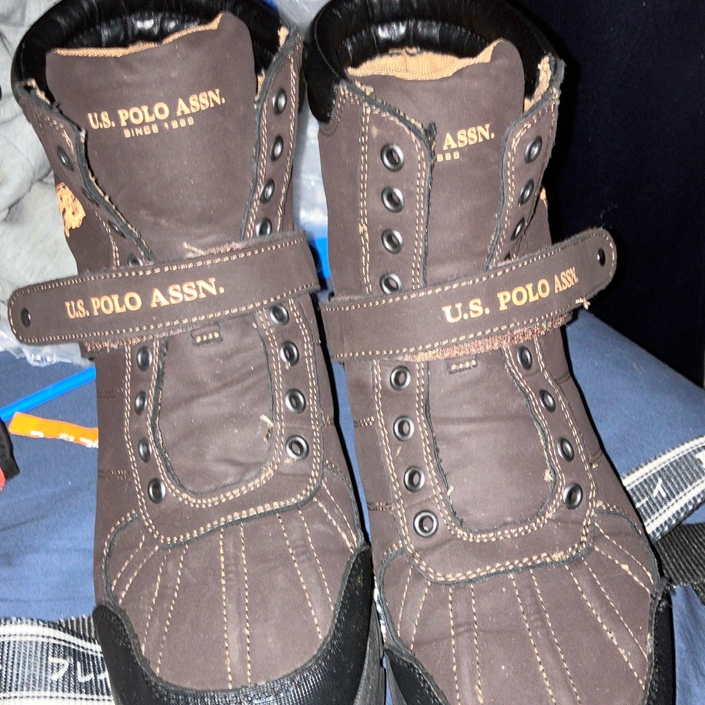 Black and green polo boots